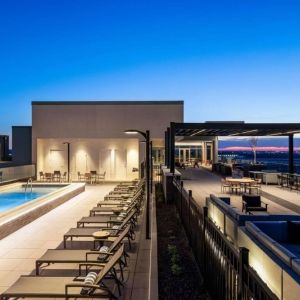 Beautiful rooftop with swimming pool and lounge area at Hilton BNA Nashville Airport Terminal.
