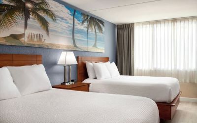 Bright and spacious day use twin room at EnVision Hotel Miami International Airport.