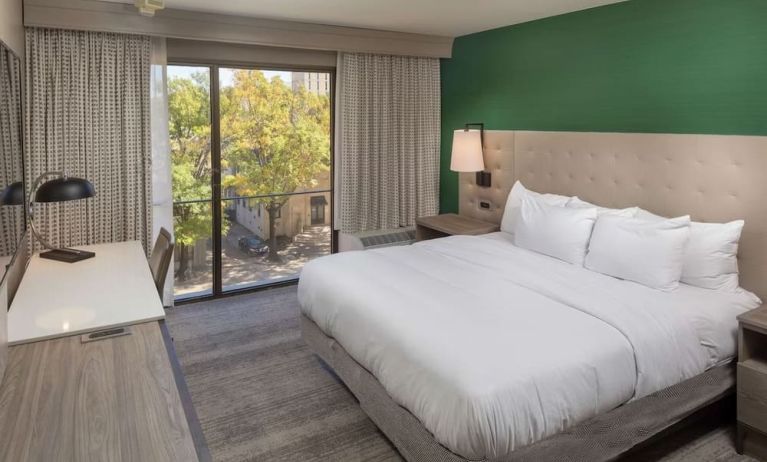 Day use room with work desk and natural light at Hilton Birmingham At UAB.