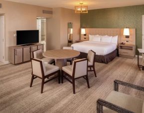 King suite with dining table at Hilton Birmingham At UAB.