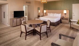 King suite with dining table at Hilton Birmingham At UAB.