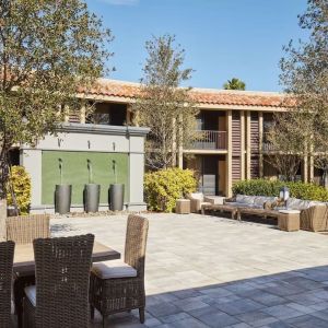 Garden with outdoor furniture at DoubleTree By Hilton Orlando At SeaWorld.