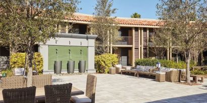 Garden with outdoor furniture at DoubleTree By Hilton Orlando At SeaWorld.