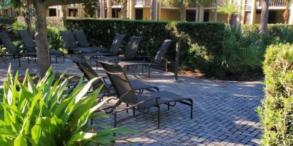 Loungers in the garden of DoubleTree By Hilton Orlando At SeaWorld.