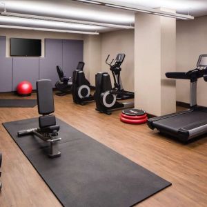 Fully equipped fitness center at Hilton Brooklyn New York.