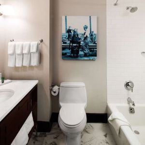 Private guest bathroom with tub at Hilton Brooklyn New York.