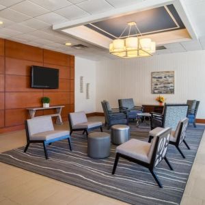Lobby lounge at EnVision Hotel And Conference Center Mansfield Foxboro.