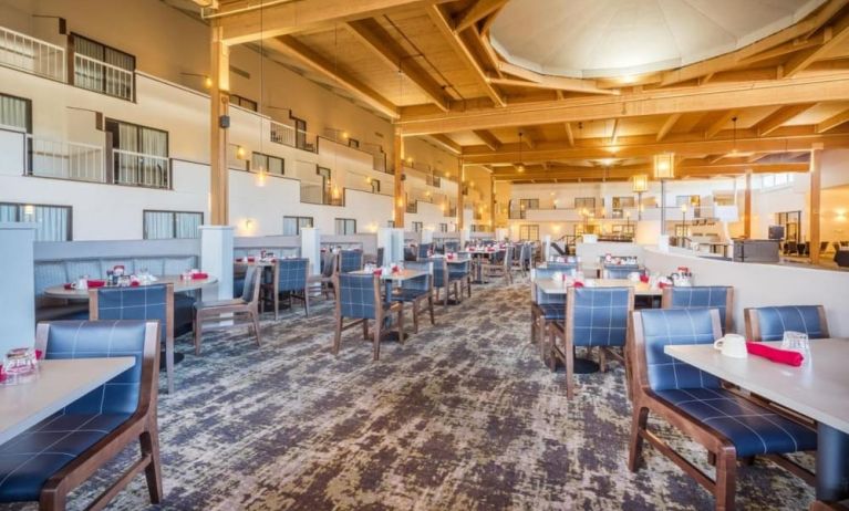 On-site restaurant at EnVision Hotel And Conference Center Mansfield Foxboro.