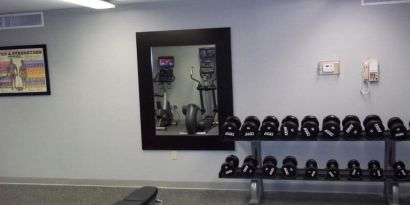 Fitness center at EnVision Hotel And Conference Center Mansfield Foxboro.