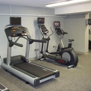 Well equipped fitness center at EnVision Hotel And Conference Center Mansfield Foxboro.