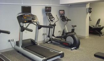 Well equipped fitness center at EnVision Hotel And Conference Center Mansfield Foxboro.