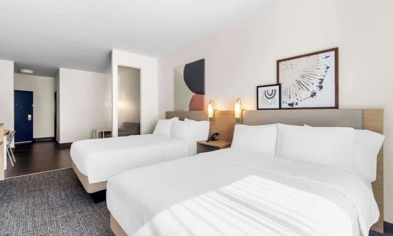 Day use twin room with work desk and private bathroom at Spark By Hilton Pearland.