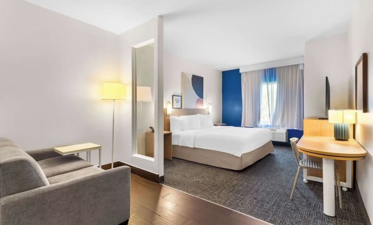 Bright and spacious day use room with lounge area at Spark By Hilton Pearland.