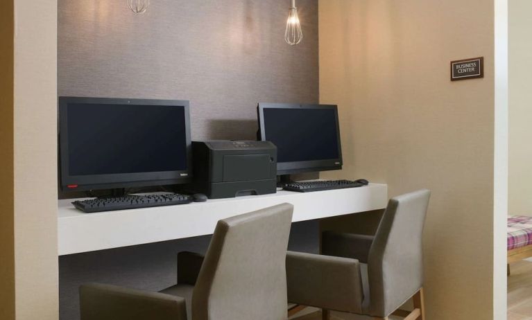 Business center with comfortable seating and printer at Sonesta ES Suites Fort Worth Fossil Creek.