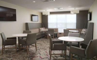 Dining area at Sonesta ES Suites Fort Worth Fossil Creek.