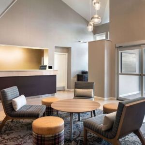 Hotel reception with lounge seating at Sonesta ES Suites Tempe.