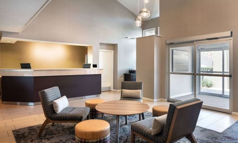 Hotel reception with lounge seating at Sonesta ES Suites Tempe.
