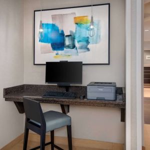 Business center with computer and printer at Sonesta ES Suites Atlanta Alpharetta North Point Mall.