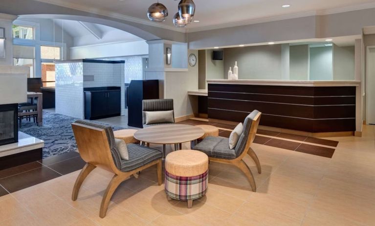 Reception and lounge area at Sonesta ES Suites Atlanta Alpharetta North Point Mall.