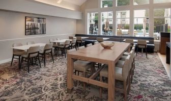 Dining area at Sonesta ES Suites Atlanta Alpharetta North Point Mall.