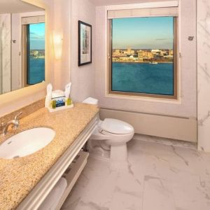 Guest bathroom with shower at Hilton Philadelphia At Penn's Landing.