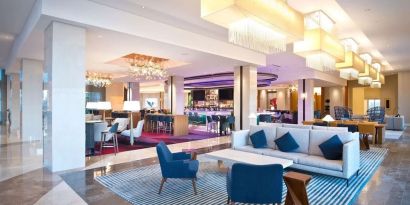 Lobby and coworking lounge at Hilton Orlando.