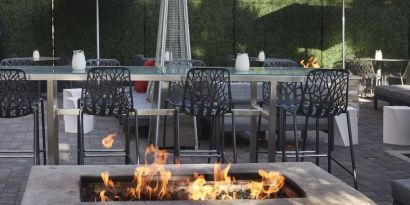 Firepit in the garden perfect for coworking at Embassy Suites By Hilton San Diego-La Jolla.