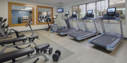 Fitness center at Embassy Suites By Hilton San Diego-La Jolla.