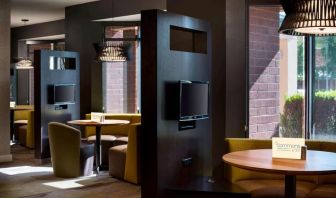 Dining area and coffee shop with comfortable seating perfect for coworking at Sonesta Select Tempe Downtown.