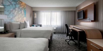 Bright and spacious day use twin room with work desk at Sonesta Select Tempe Downtown.