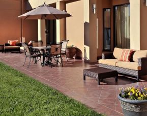Outdoor lounge area at Sonesta Select Raleigh Durham Airport Morrisville.