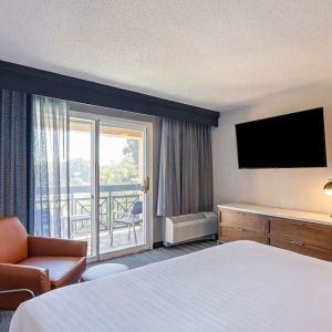 Bright and spacious day use room with balcony and work desk at Sonesta Select Pleasant Hill.