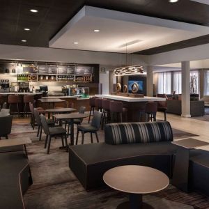 Dining area with comfortable seating, perfect for coworking at Sonesta Select Phoenix Camelback.