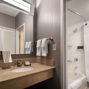 Private guest bathroom with free toiletries at Sonesta Select Phoenix Camelback.