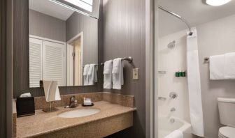 Private guest bathroom with free toiletries at Sonesta Select Phoenix Camelback.