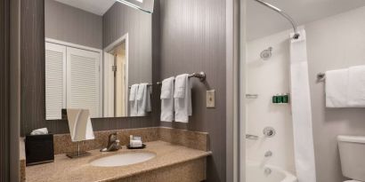 Private guest bathroom with free toiletries at Sonesta Select Phoenix Camelback.