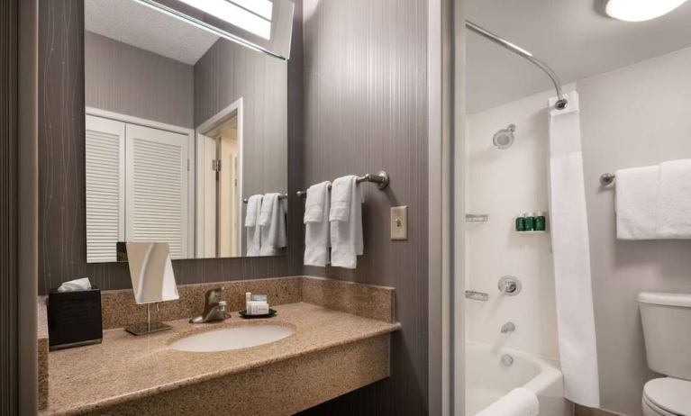 Private guest bathroom with free toiletries at Sonesta Select Phoenix Camelback.