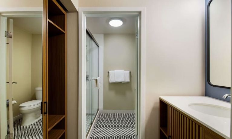Private guest bathroom with shower at Sonesta Select Philadelphia Airport.