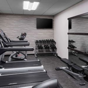 Well equipped fitness center at Sonesta Select Newport Middletown.