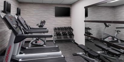 Well equipped fitness center at Sonesta Select Newport Middletown.
