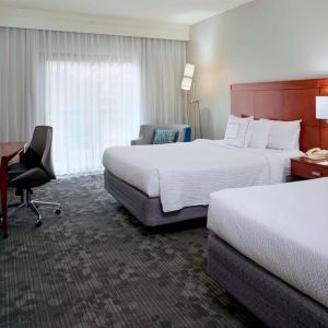 Bright and spacious day use twin room with work desk at Sonesta Select Kansas City Airport Tiffany Springs.
