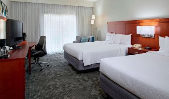 Bright and spacious day use twin room with work desk at Sonesta Select Kansas City Airport Tiffany Springs.