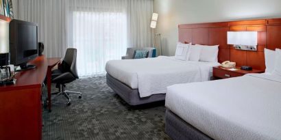 Bright and spacious day use twin room with work desk at Sonesta Select Kansas City Airport Tiffany Springs.