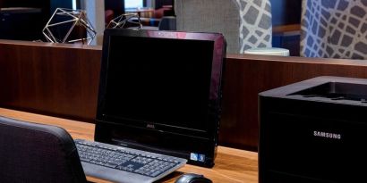 Business center with computer and printer at Sonesta Select Kansas City Airport Tiffany Springs.