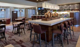 Dining area perfect for coworking at Sonesta Select Indianapolis Carmel.