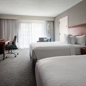 Bright and spacious day use twin room with work desk and floor to ceiling window at Sonesta Select Los Angeles LAX El Segundo.