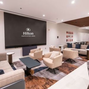Lobby and coworking lounge at Hilton Crystal City At Washington Reagan National Airport.