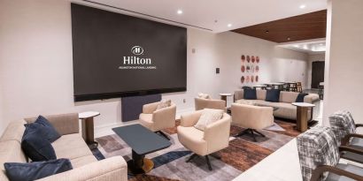 Lobby and coworking lounge at Hilton Crystal City At Washington Reagan National Airport.
