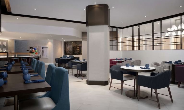 Dining area perfect for coworking at Hilton Crystal City At Washington Reagan National Airport.