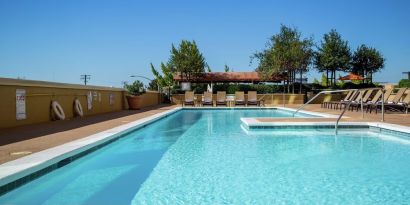 Relaxing outdoor pool at DoubleTree By Hilton Modesto.
